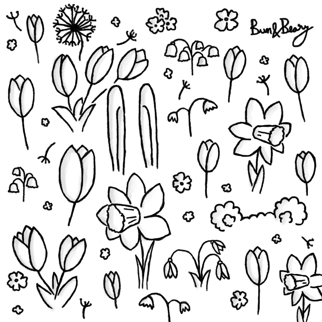 Bun's ears and Beary's ears showing from a field of daffodils, tulips, snowdrops, lilies of the valley, dandelions