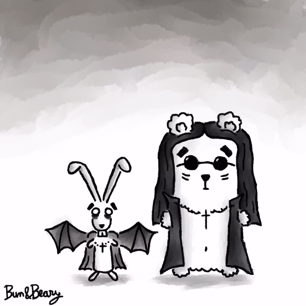 Black and white comic-style illustration of Bun and Beary dressed as a tribute to Ozzy Osbourne. Bun wears bat wings and vampire fangs, while Beary stands with long black hair, round sunglasses, a bare chest, and an open cape — mimicking Ozzy’s iconic look. The mood is a playful yet heartfelt homage.