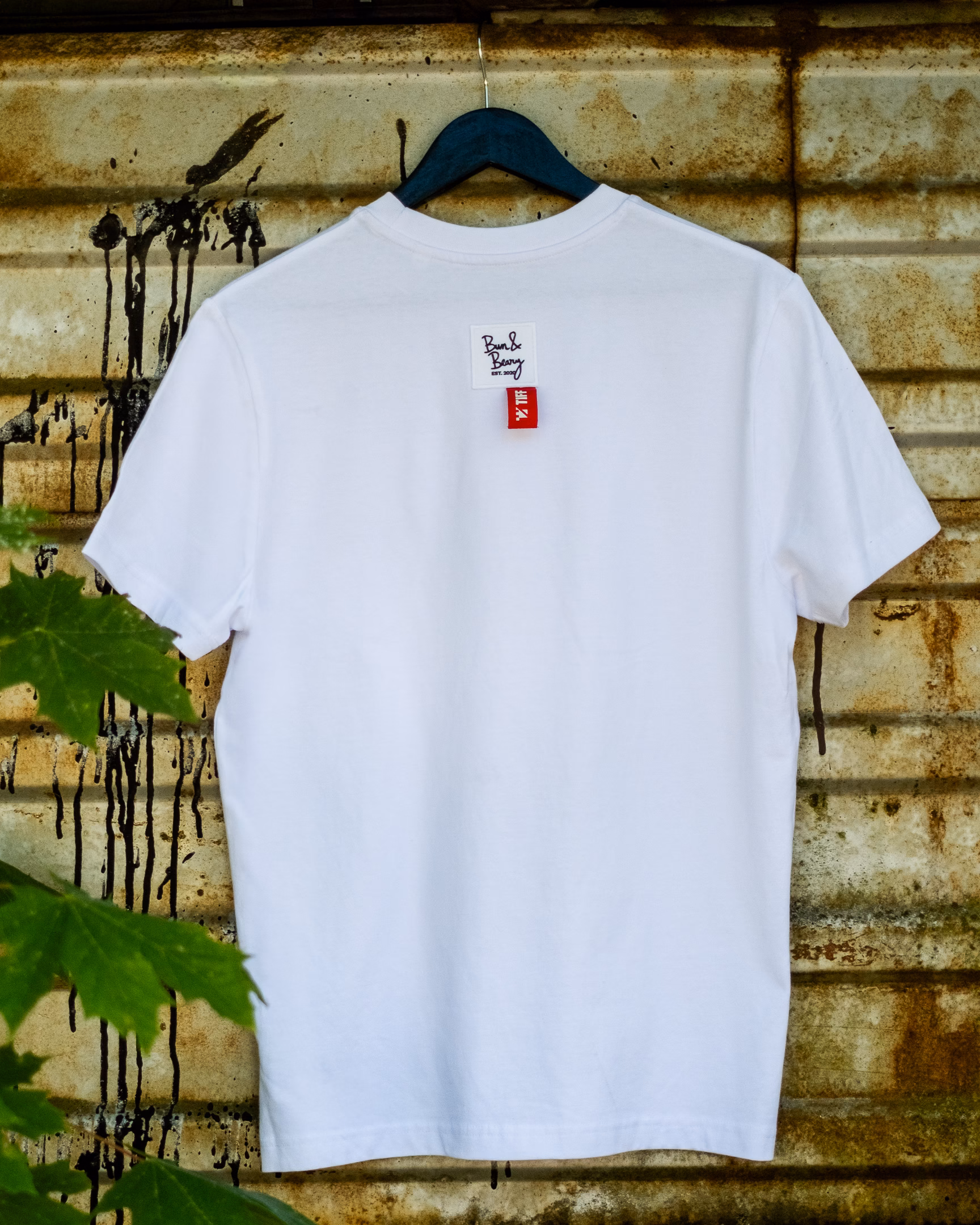 Back of the Side by Side white Bun&Beary × TIFF T-shirt with co-branded neckline labels